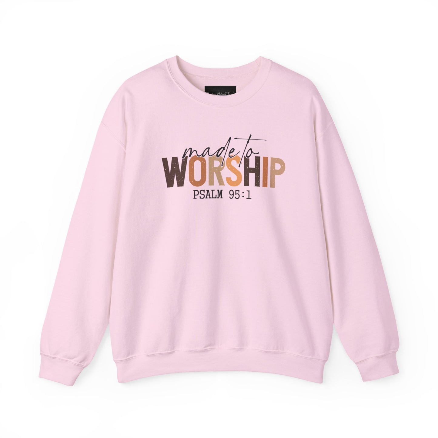 On the front of this Christian pullover sweatshirt it says Made To Worship Psalm 95:1, the word worship is done in large block letters with every letter being a different shade of brown.