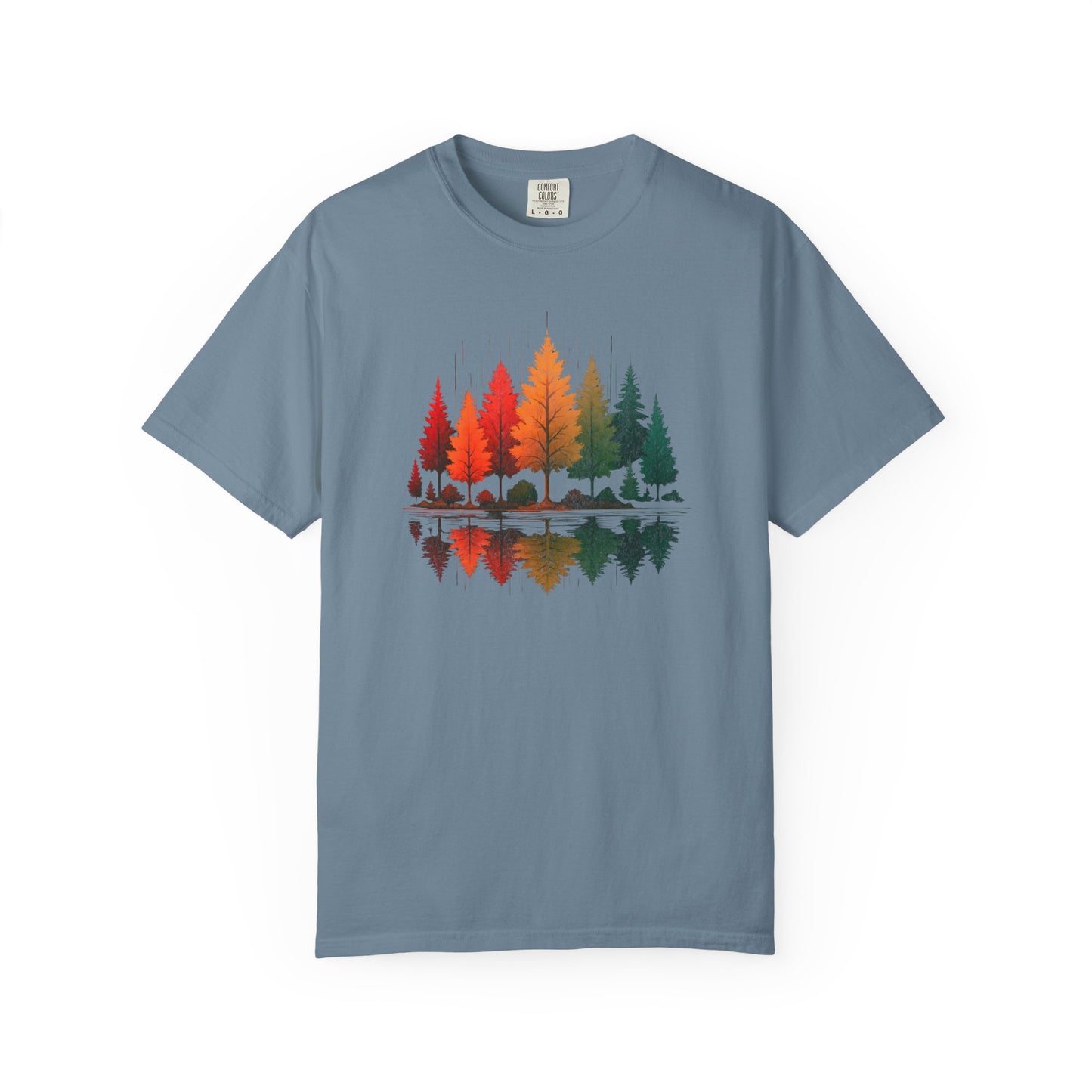 On the front of this custom comfort colors short sleeve shirt is a image of trees in the fall time with all the different fall colors, the trees reflection is right underneath making them look like they are above water.