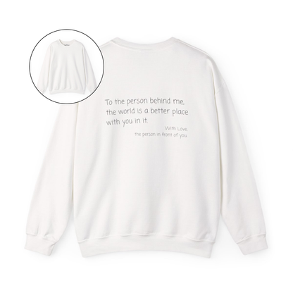 On the back of this custom sweater it says, To the person behind me the world is a better place with you in it with love the person in front of you.