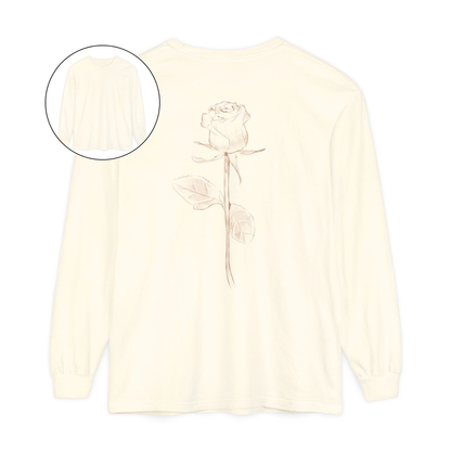 On the back of this custom women's long sleeve tee is a beige colored long stem rose that is the length of the shirt