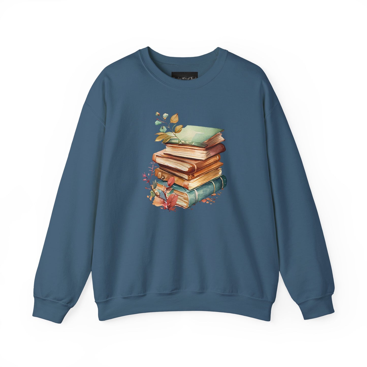 On the front of this custom book lovers sweatshirt is a stack of vintage books with a bunch of wildflowers all around the books.