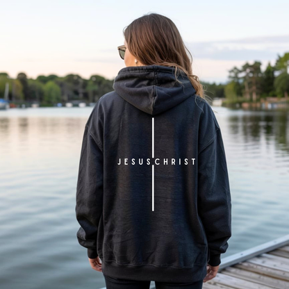 On the back of this custom Christian hoodie is the name Jesus Christ with a line above and below the name making it look like a cross.