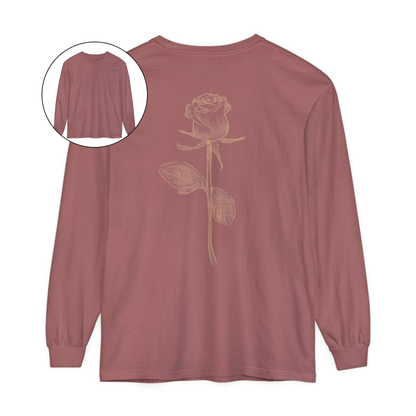 On the back of this custom women's long sleeve tee is a beige colored long stem rose that is the length of the shirt