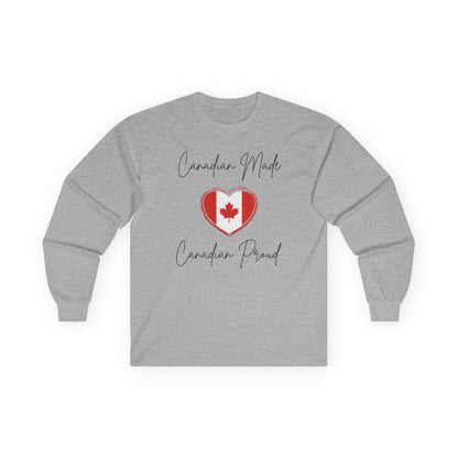 On the front of this custom Canadian patriotic long sleeve t-shirt are the words Canadian Made Canadian Proud in a beautiful cursive font, there is a Canadian flag in the middle that is in the shape of a heart.
