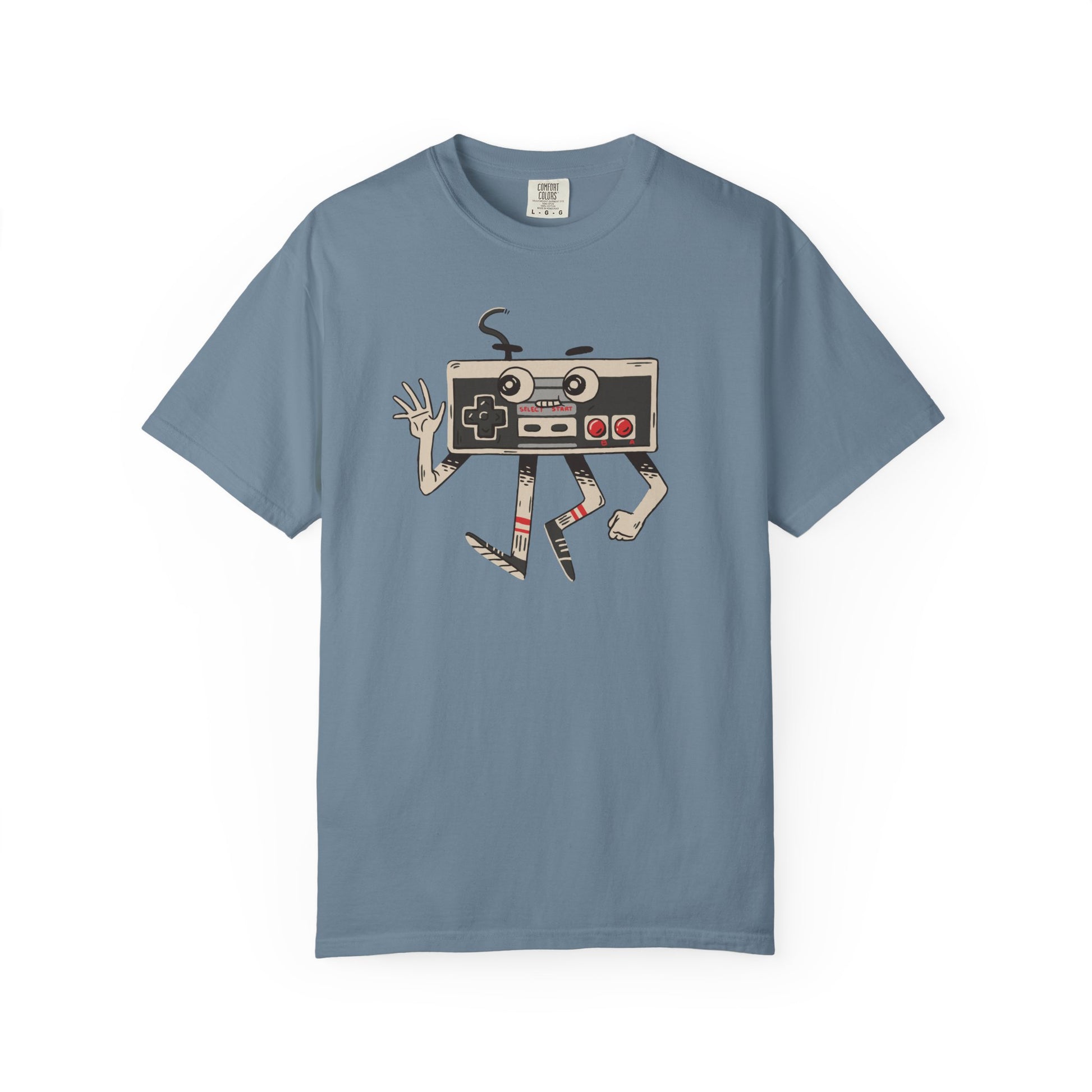 On the front of this custom vintage gaming short sleeve shirt is an image of a old school Nintendo controller, the controller has arms and legs and a face that makes it look like a cartoon character.