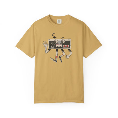 On the front of this custom vintage gaming short sleeve shirt is an image of a old school Nintendo controller, the controller has arms and legs and a face that makes it look like a cartoon character.
