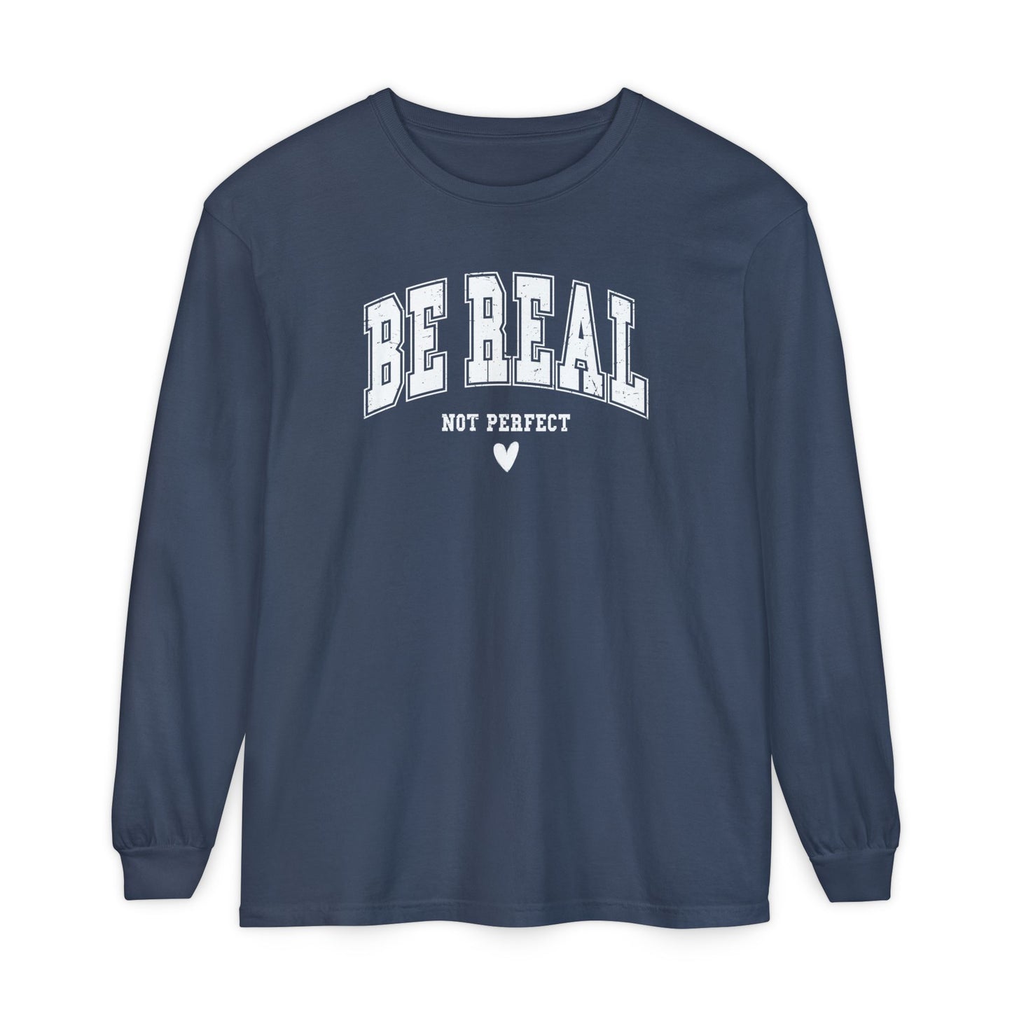 On the front of this custom unisex long sleeve shirt are the words Be Real in large bubble font with the words not perfect underneath the bubble letters, on the bottom there is a heart.