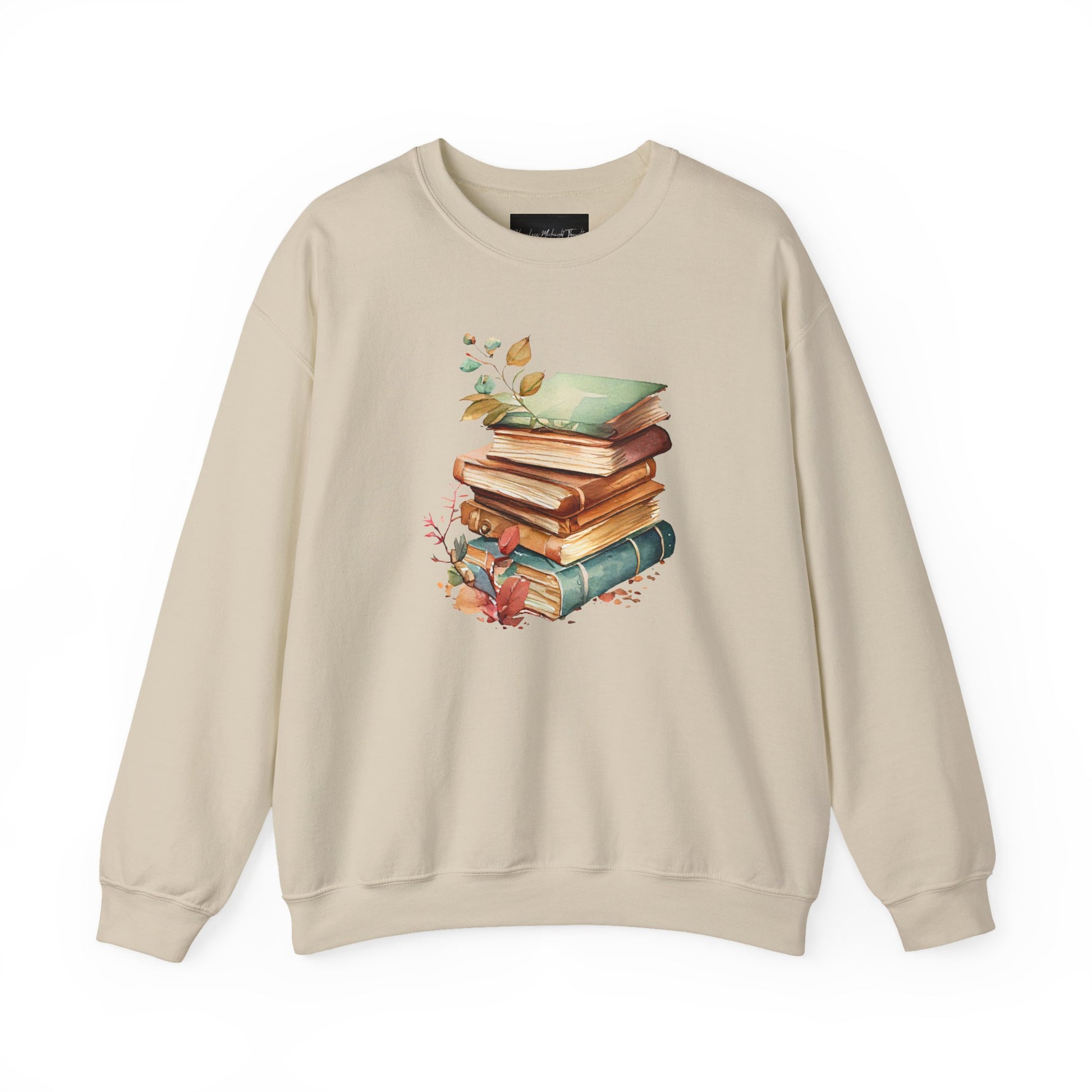 On the front of this custom book lovers sweatshirt is a stack of vintage books with a bunch of wildflowers all around the books.