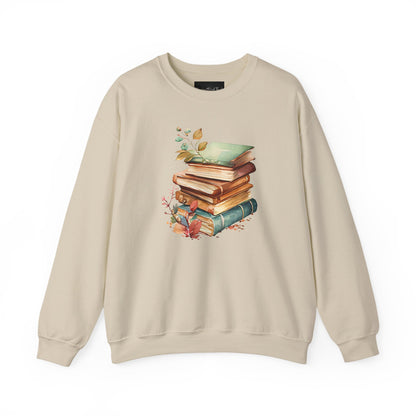On the front of this custom book lovers sweatshirt is a stack of vintage books with a bunch of wildflowers all around the books.