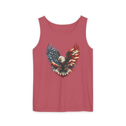 On the front of this unisex tank top is an image of an American Bald Eagle with it's wings out, the feathers of the bald eagle are the colors of the American flag being red, white and blue, there are also stars on one side of the eagle’s wings.