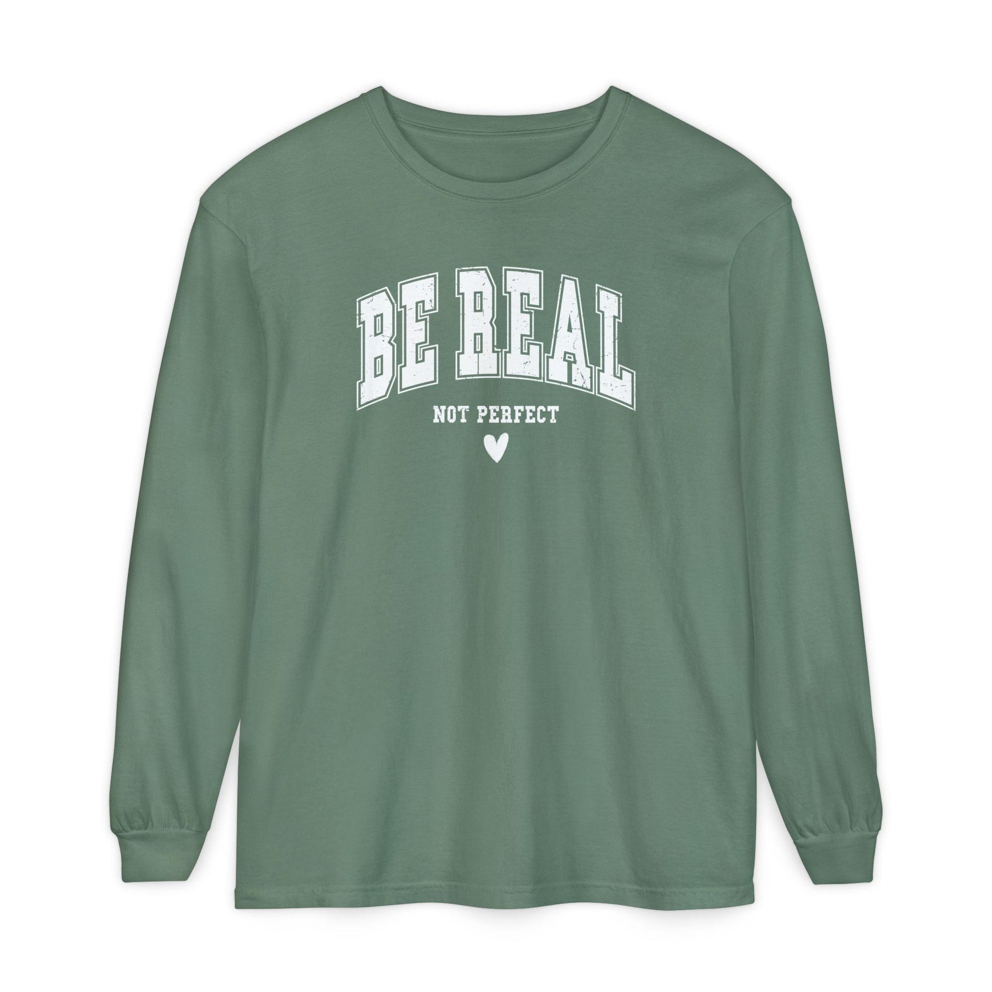 On the front of this custom unisex long sleeve shirt are the words Be Real in large bubble font with the words not perfect underneath the bubble letters, on the bottom there is a heart.