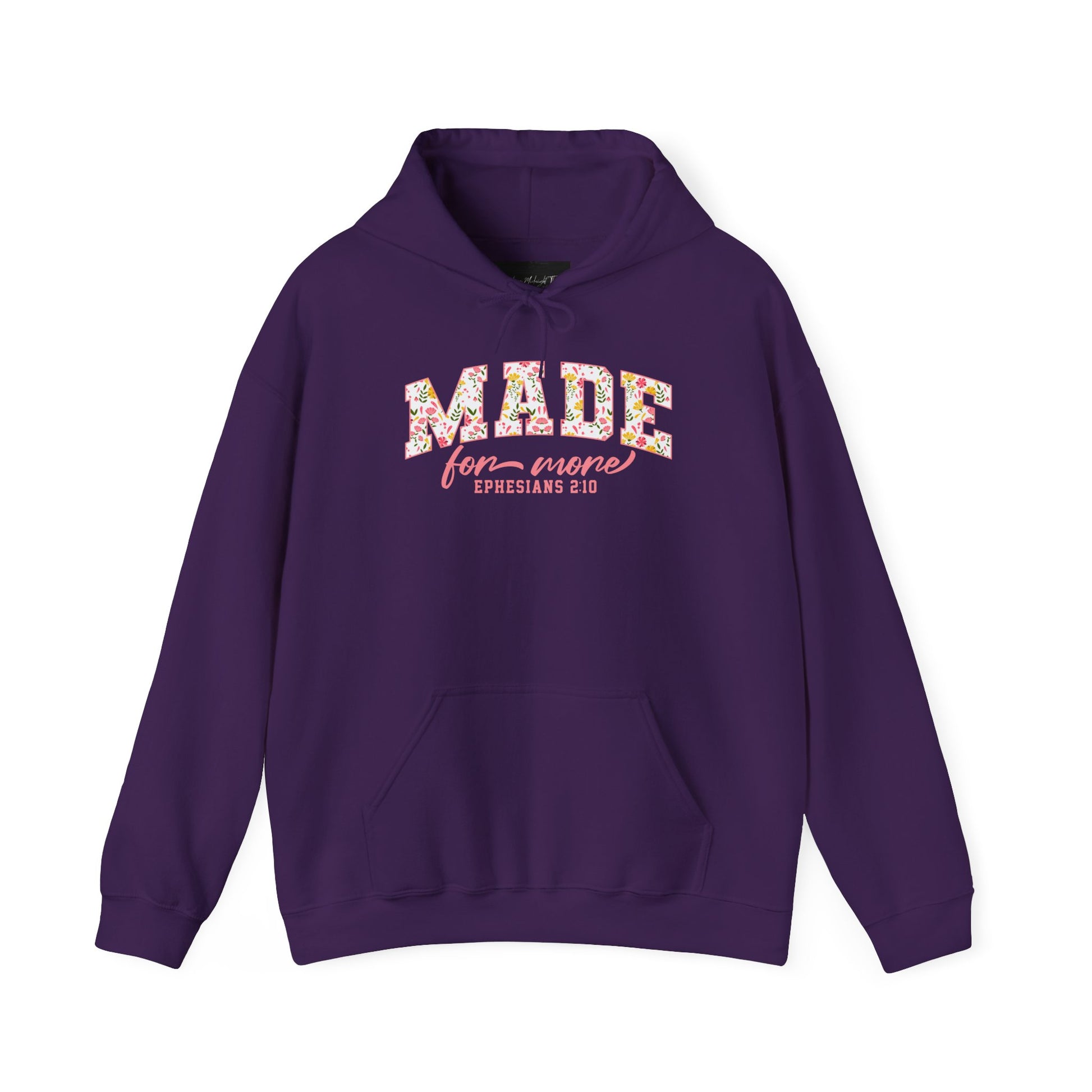 On the front of this custom Christian hoodie is the bible verse the says Made for more Ephesians 2:10, with the word "Made" being large block letters with a pink floral pattern inside the letters, all the other words are in a light pink color.