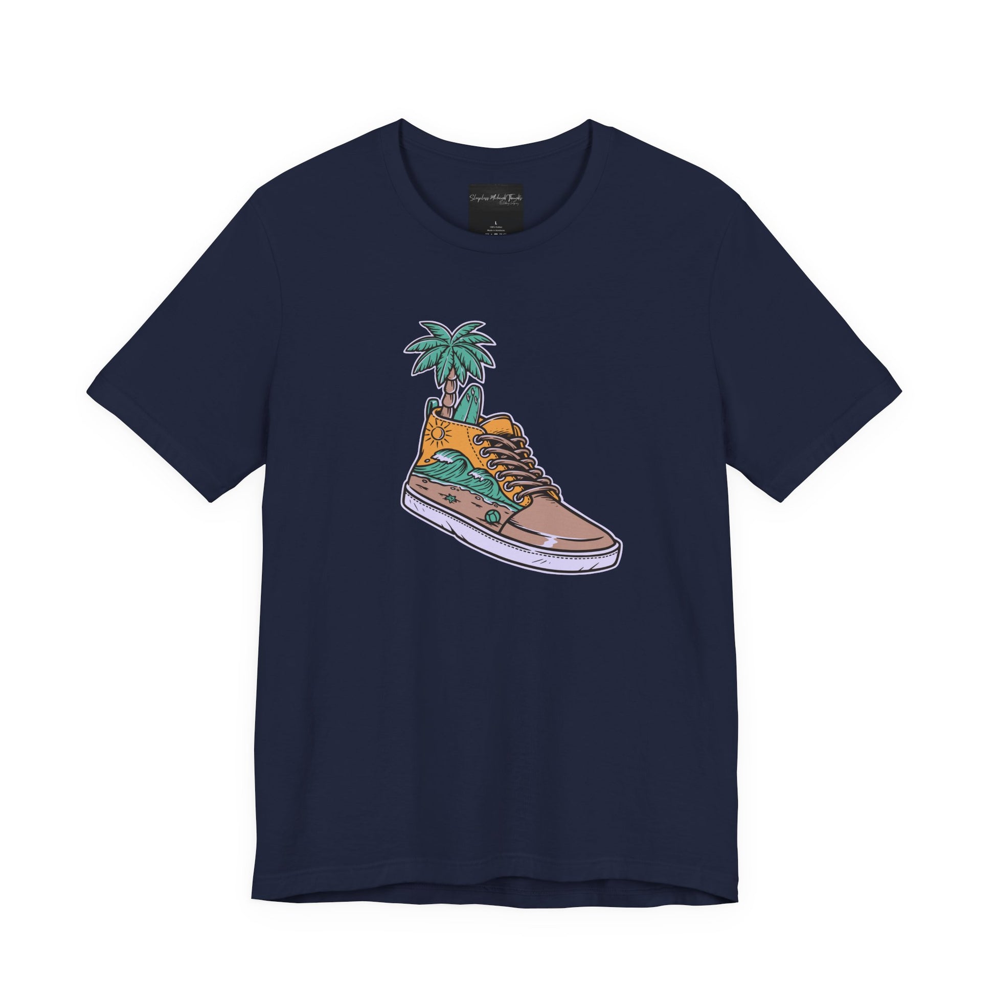 On the front of this custom handmade short sleeve shirt is an image of a high top running shoe with ocean waves running along the side of the shoe, coming out of the top of the shoe where your foot goes is a palm tree and a surf board.