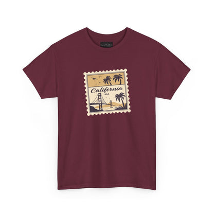 On the front of this custom vintage short sleeve shirt is a California postage stamp with images of the golden gate bridge, palm trees and the ocean on it, the entire stamp is different shades of beige.