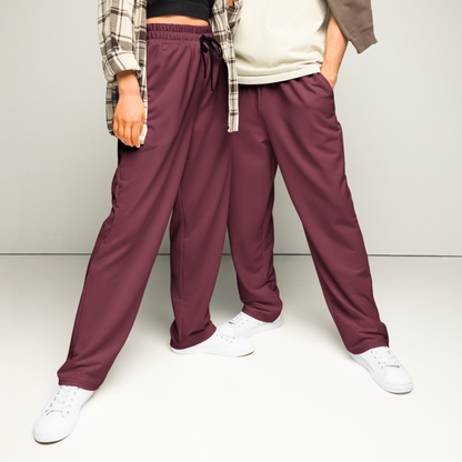 These wide legged joggers are all a deep maroon in color from top to bottom with black strings around the waistband.