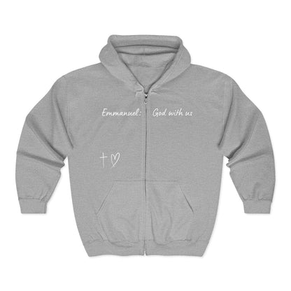 This Unisex Heavy Blend™ Full Zip Hooded Sweatshirt features the words Emmanuel God With Us on the upper chest and an image of a cross with a heart above the pocket.