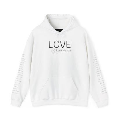 A cozy and warm custom Christian hoodie featuring a powerful message of love and faith. The front displays the word LOVE Like Jesus, accompanied by a cross with a heart. Each sleeve showcases the scripture 1 Corinthians 13:4-7