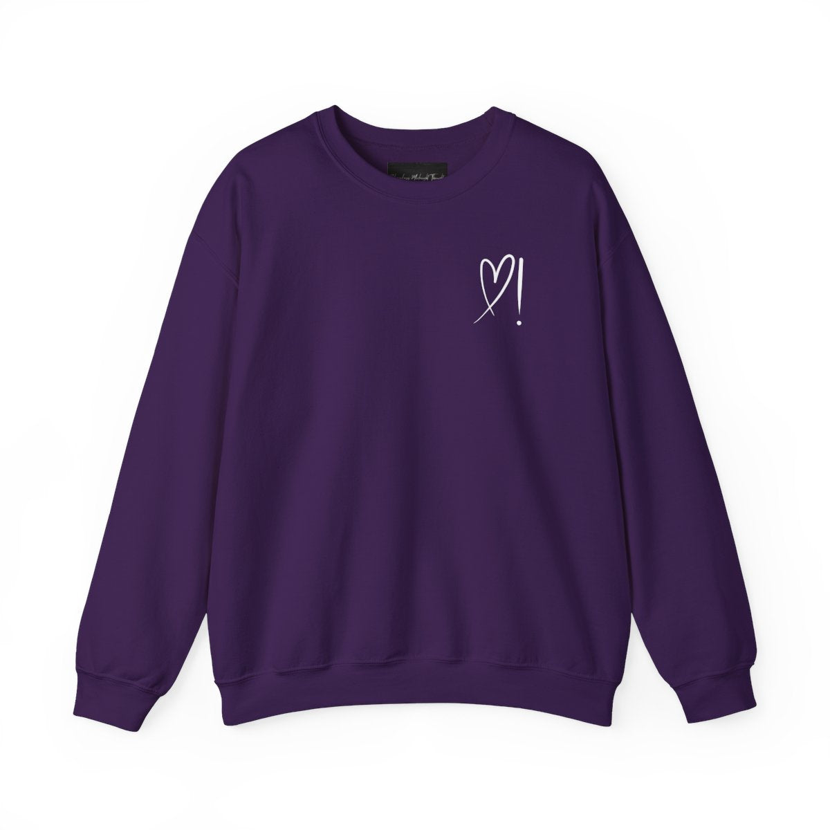 A handmade unisex oversized pullover sweatshirt with a crewneck, on the front left chest of the sweater in white is a heart with an exclamation point on the left hand side if the heart
