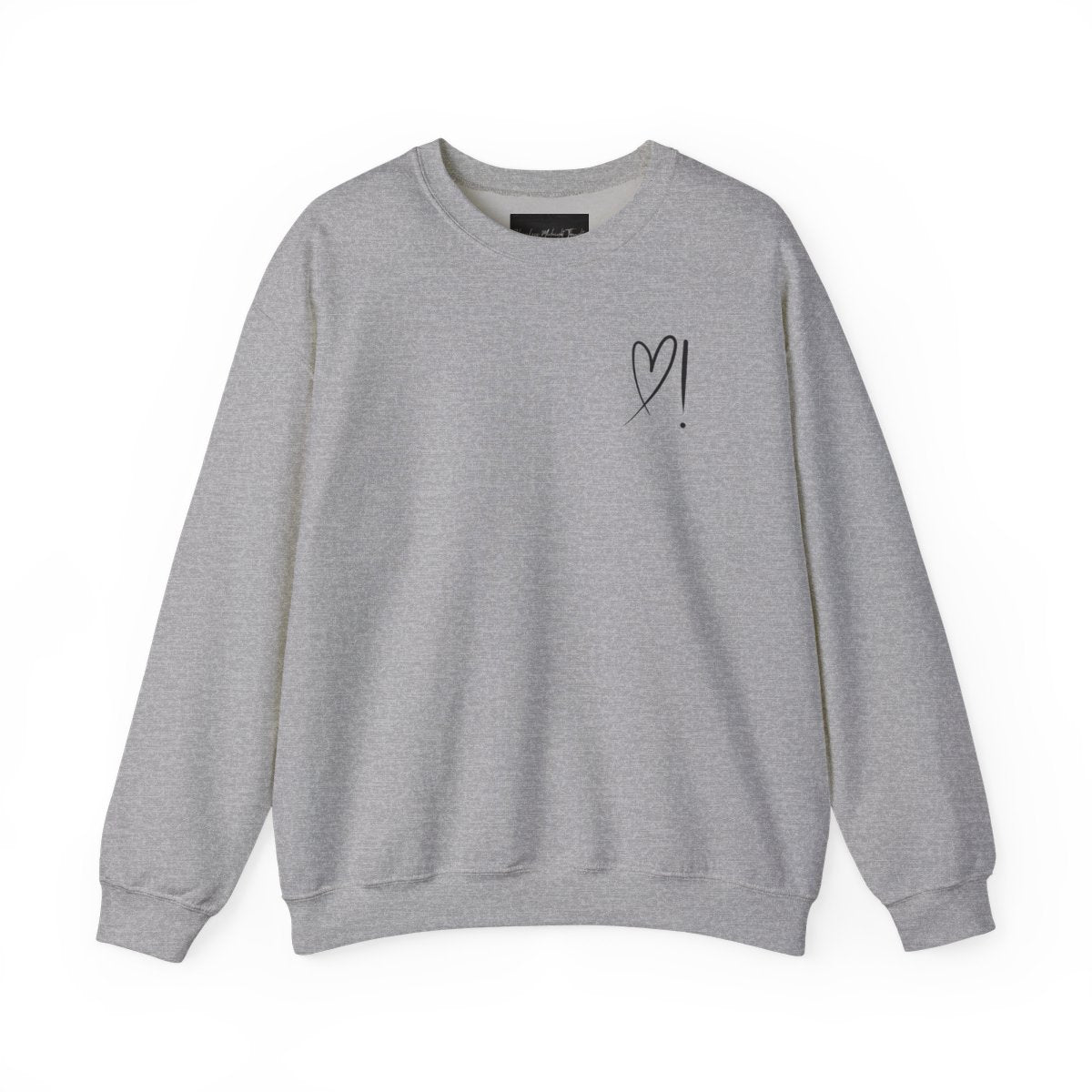 A handmade unisex oversized pullover sweatshirt with a crewneck, on the front left chest of the sweater in white is a heart with an exclamation point on the left hand side if the heart