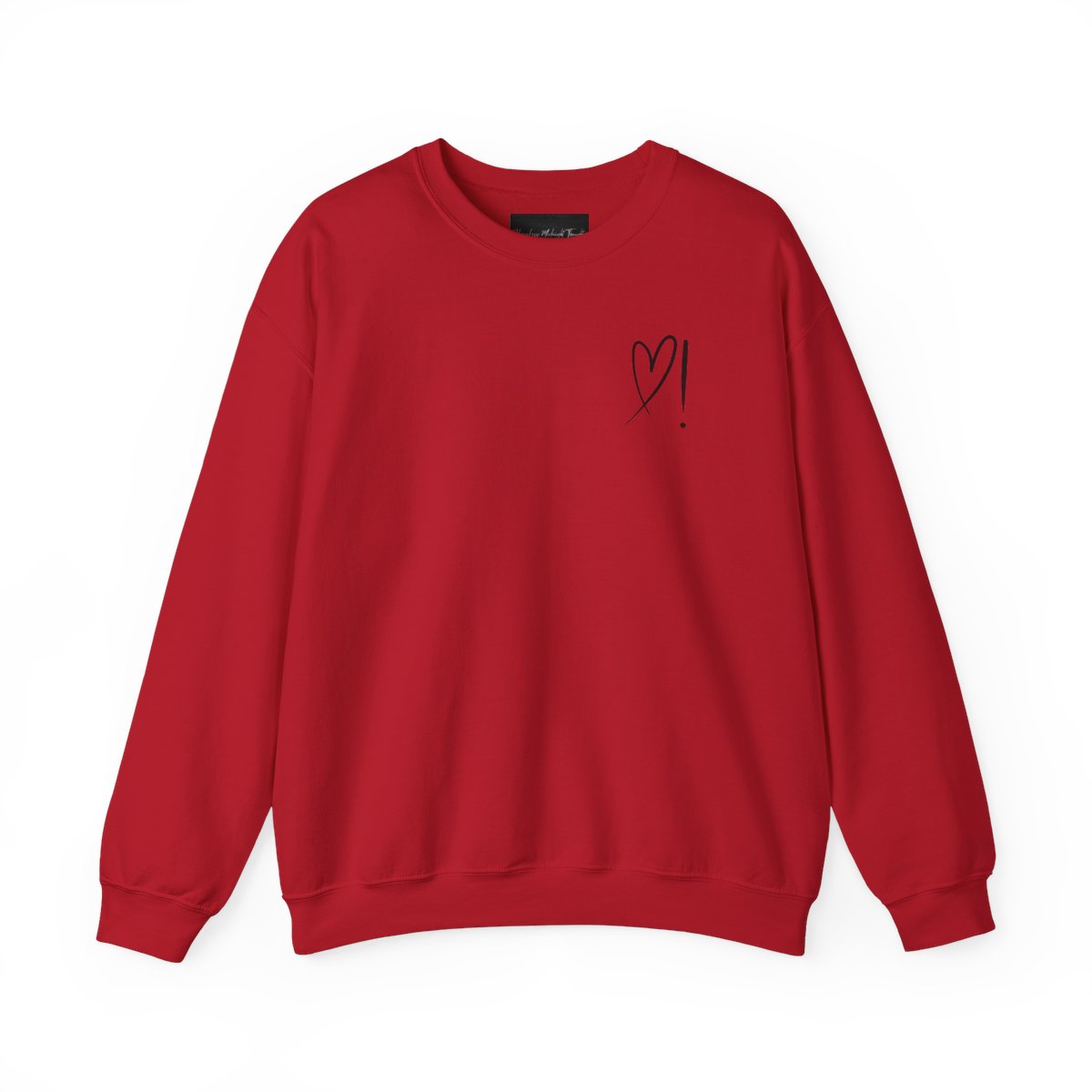A handmade unisex oversized pullover sweatshirt with a crewneck, on the front left chest of the sweater in white is a heart with an exclamation point on the left hand side if the heart
