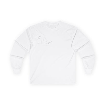 This Christian unisex Long Sleeve t-shirt features the words Be The Light Matthew 5:14 in a simple cursive font with an image of a line drawing of a candle next to the word light.