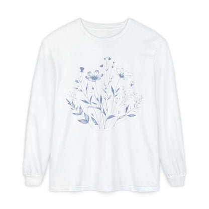 On the front of this custom women's long sleeve t-shirt is a image of a bunch of wildflowers and leaves coming from the bottom of the shirt to the very top, the flowers and leaves are in a light blue color.