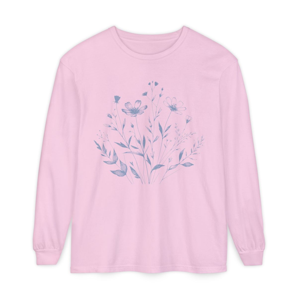 On the front of this custom women's long sleeve t-shirt is a image of a bunch of wildflowers and leaves coming from the bottom of the shirt to the very top, the flowers and leaves are in a light blue color.