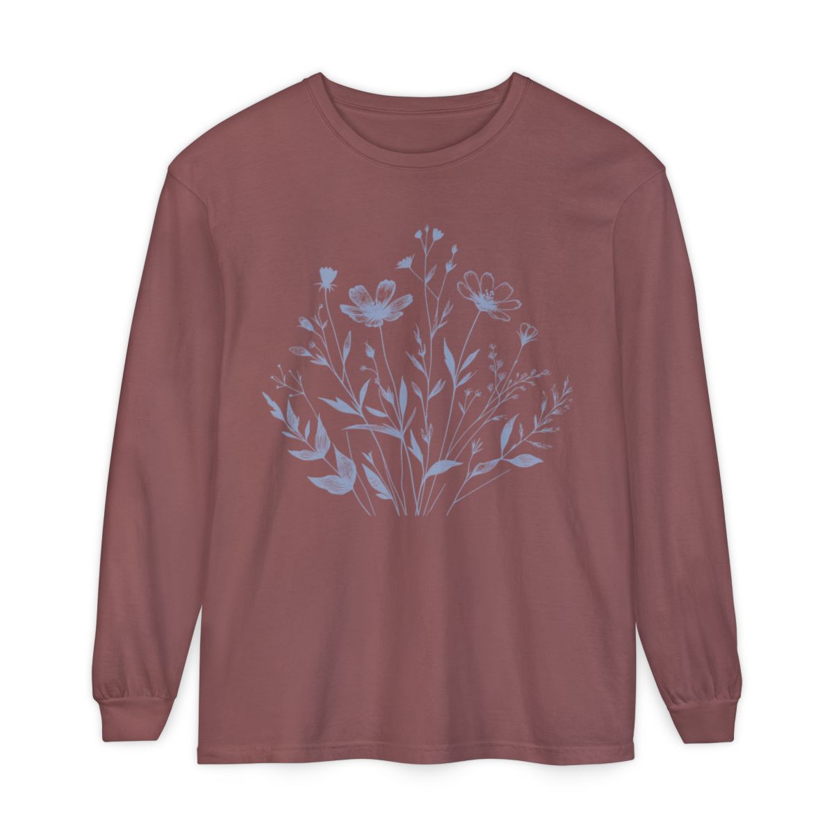 On the front of this custom women's long sleeve t-shirt is a image of a bunch of wildflowers and leaves coming from the bottom of the shirt to the very top, the flowers and leaves are in a light blue color.