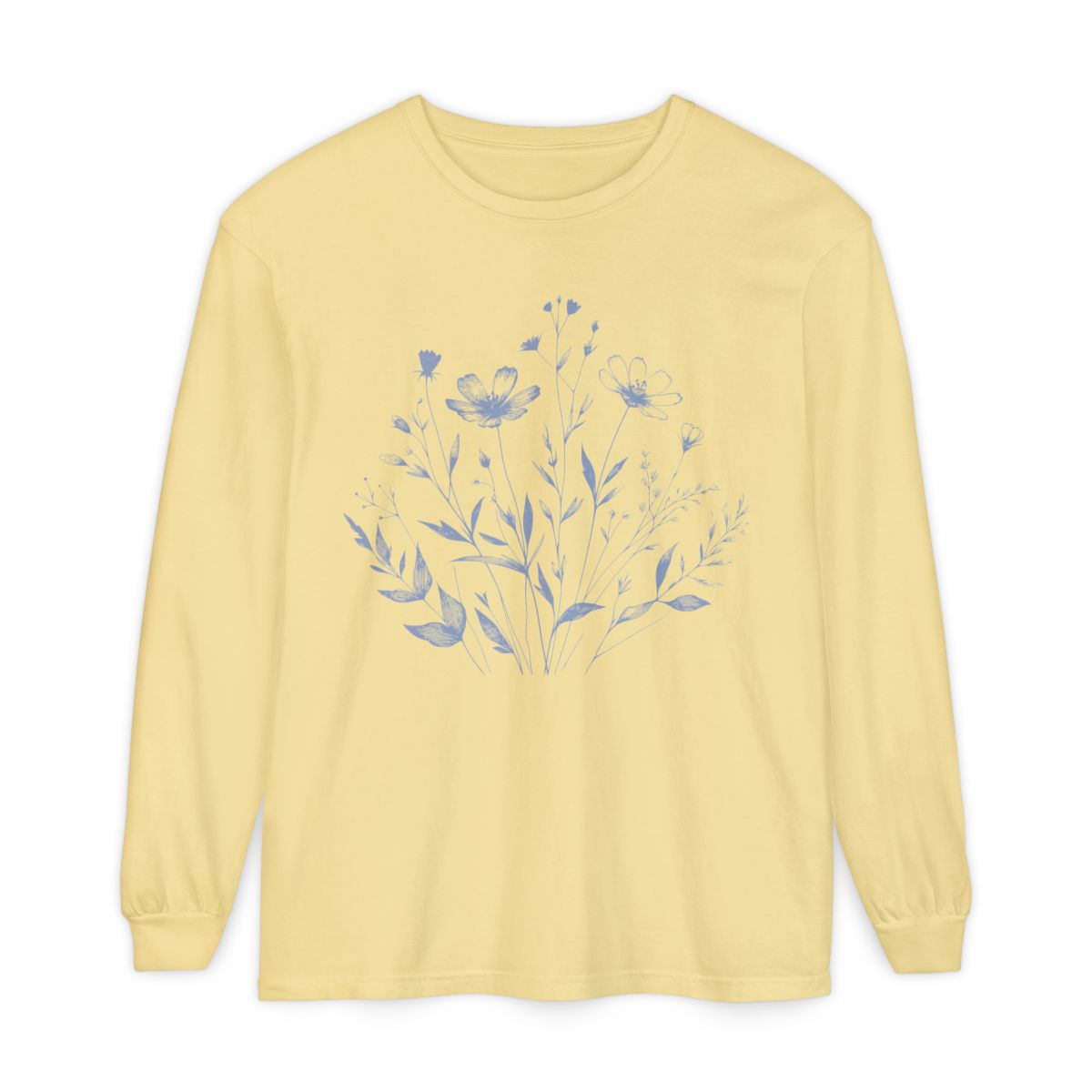 On the front of this custom women's long sleeve t-shirt is a image of a bunch of wildflowers and leaves coming from the bottom of the shirt to the very top, the flowers and leaves are in a light blue color.