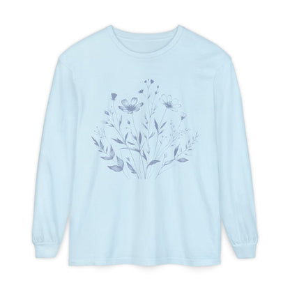 On the front of this custom women's long sleeve t-shirt is a image of a bunch of wildflowers and leaves coming from the bottom of the shirt to the very top, the flowers and leaves are in a light blue color.