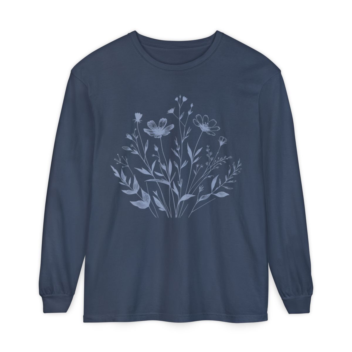 On the front of this custom women's long sleeve t-shirt is a image of a bunch of wildflowers and leaves coming from the bottom of the shirt to the very top, the flowers and leaves are in a light blue color.