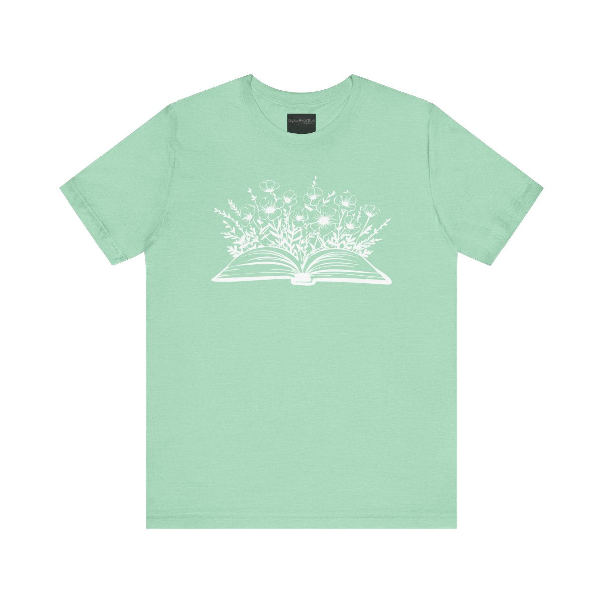 On the front of this custom women's book lover shirt is a image of a book with it opened in the middle, there are a bunch of wildflowers coming out of the center of the book.