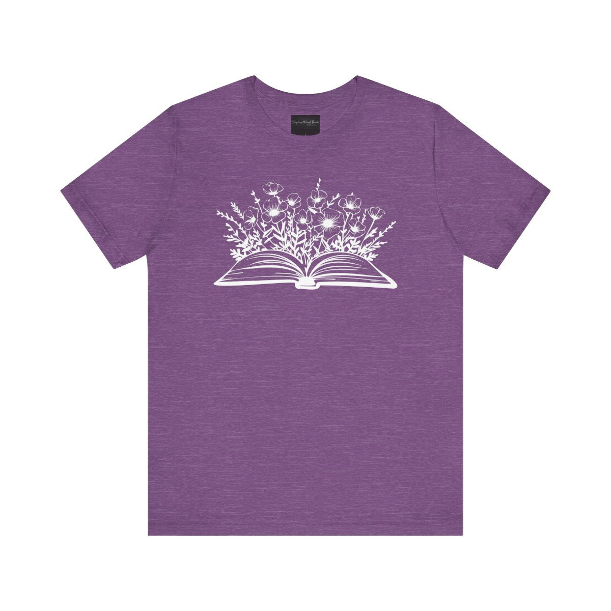 On the front of this custom women's book lover shirt is a image of a book with it opened in the middle, there are a bunch of wildflowers coming out of the center of the book.