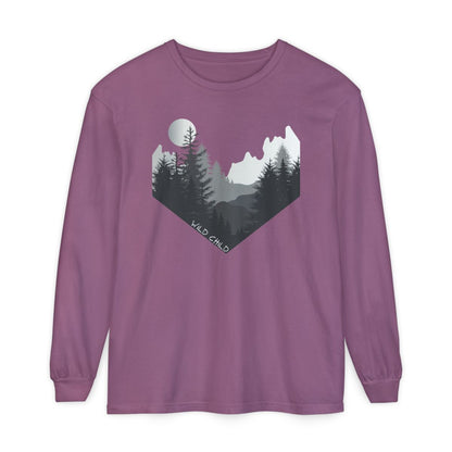 The image on the front of this custom long sleeve shirt is all in black and grey with there being mountains and trees on both sides in the shape on a v making it looking as if you are looking down a valley, the words wild child are in white on the bottom left of the image.