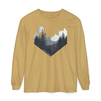 The image on the front of this custom long sleeve shirt is all in black and grey with there being mountains and trees on both sides in the shape on a v making it looking as if you are looking down a valley, the words wild child are in white on the bottom left of the image.