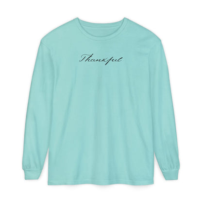 On the front of this custom unisex long sleeve t-shirt is the word thankful in a flowy cursive font.