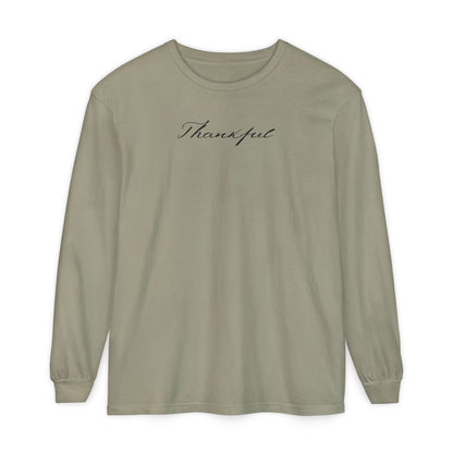 On the front of this custom unisex long sleeve t-shirt is the word thankful in a flowy cursive font.