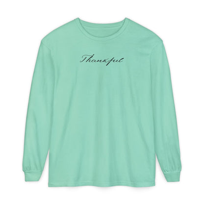 On the front of this custom unisex long sleeve t-shirt is the word thankful in a flowy cursive font.