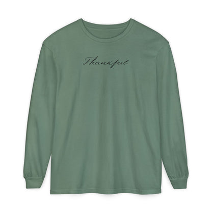 On the front of this custom unisex long sleeve t-shirt is the word thankful in a flowy cursive font.