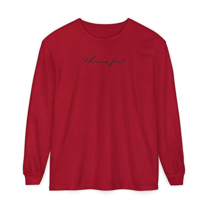 On the front of this custom unisex long sleeve t-shirt is the word thankful in a flowy cursive font.