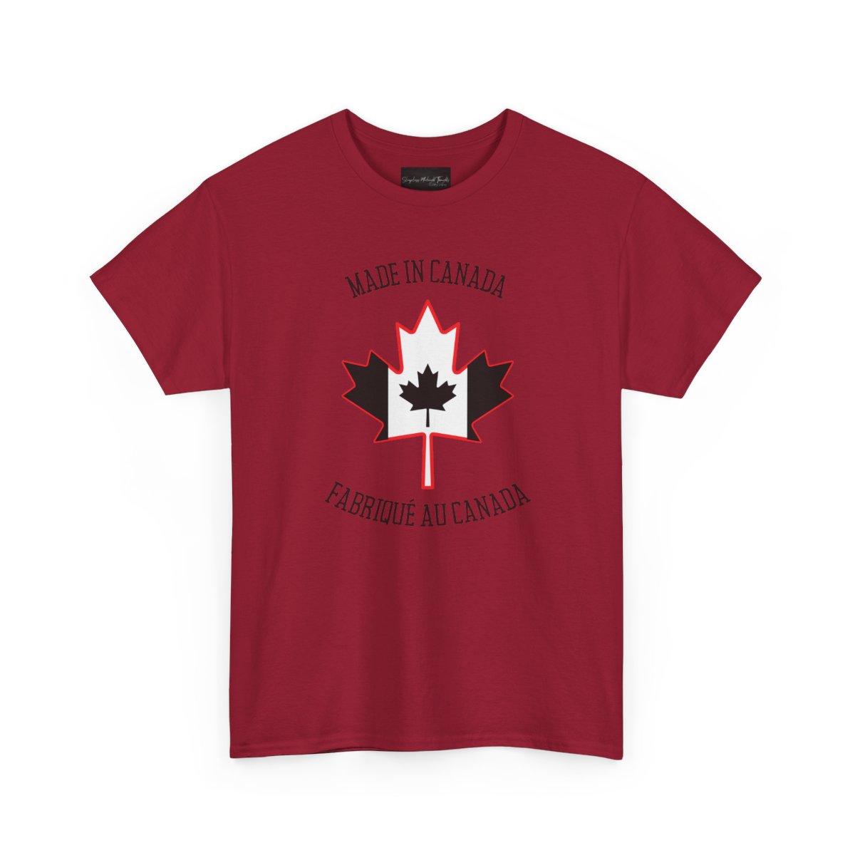 On the front of this custom unisex t-shirt is a large maple leaf with the Canadian flag on the inside, the words Made In Canada are above the maple leaf with the same in French underneath that says Fabrique Au Canada.