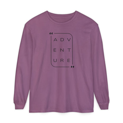 On the front of this super soft unisex long sleeve shirt is the word adventure with there being three letters on each line, it is in a modern font. There is a border around the word.