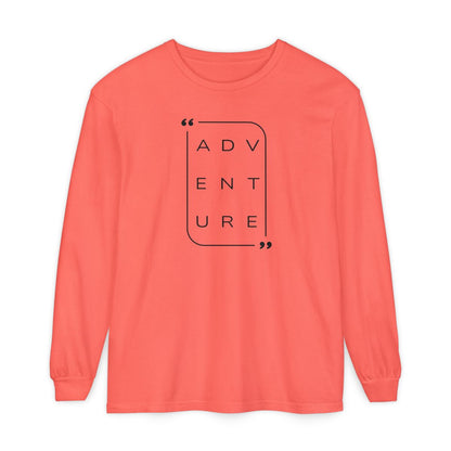 On the front of this super soft unisex long sleeve shirt is the word adventure with there being three letters on each line, it is in a modern font. There is a border around the word.