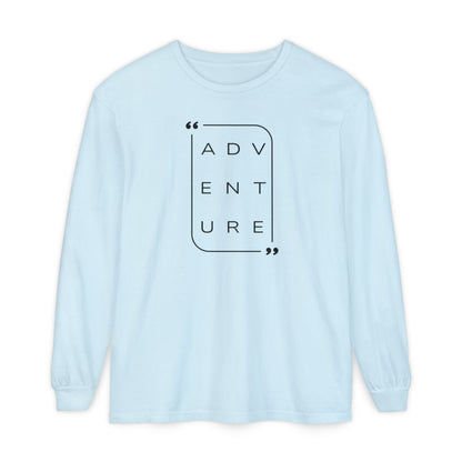 On the front of this super soft unisex long sleeve shirt is the word adventure with there being three letters on each line, it is in a modern font. There is a border around the word.