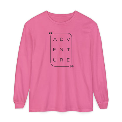 On the front of this super soft unisex long sleeve shirt is the word adventure with there being three letters on each line, it is in a modern font. There is a border around the word.
