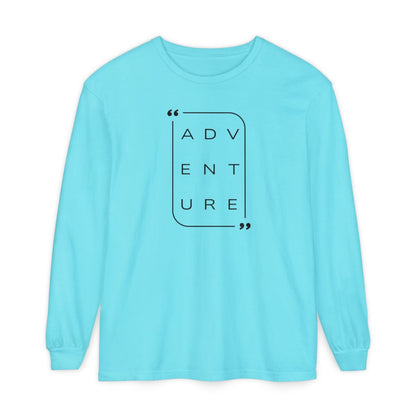 On the front of this super soft unisex long sleeve shirt is the word adventure with there being three letters on each line, it is in a modern font. There is a border around the word.