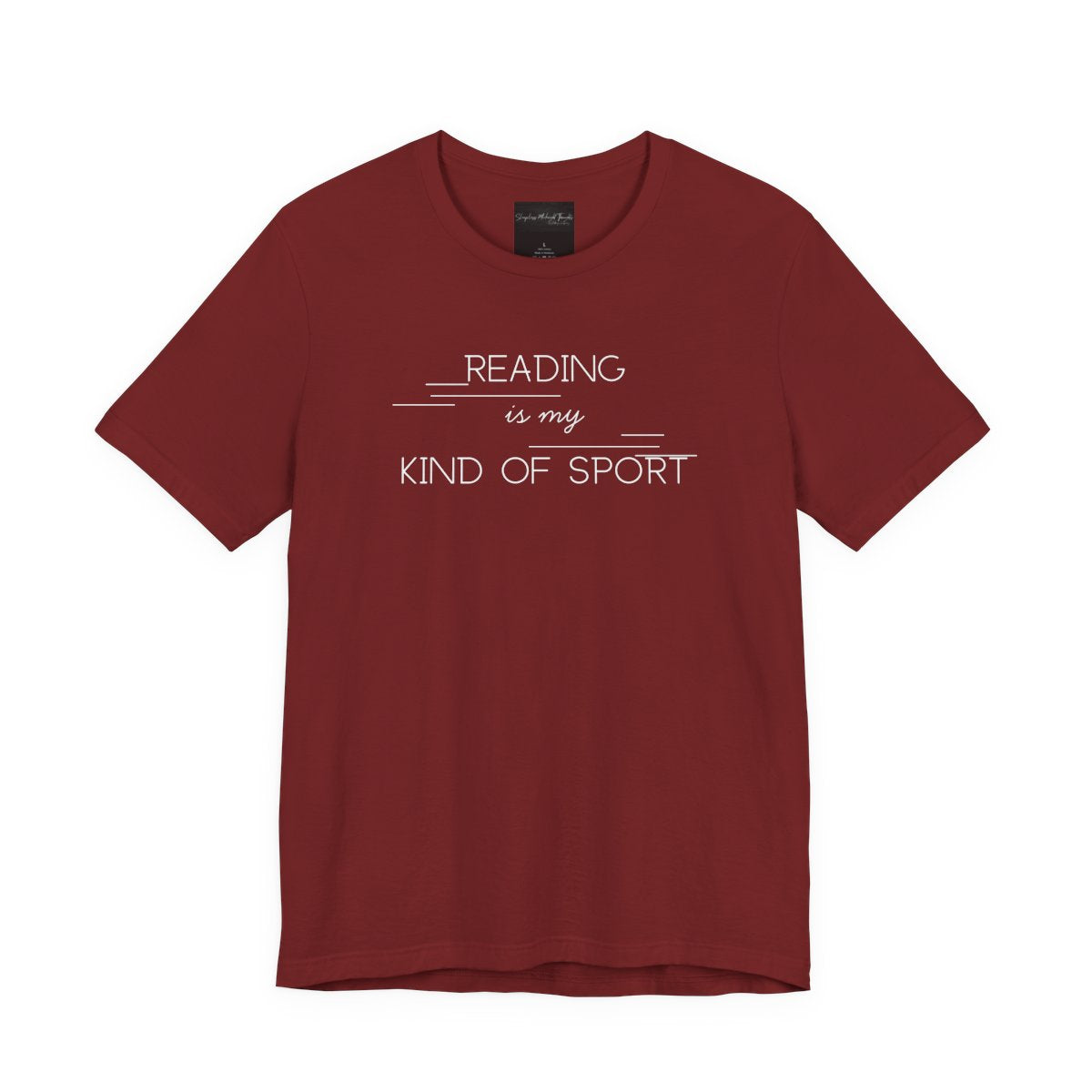 On the front of this custom booklover short sleeve shirt are the words Reading is my Kind of Sport, in a modern font with different length lines on either end of the writing giving the shirt a retro look.