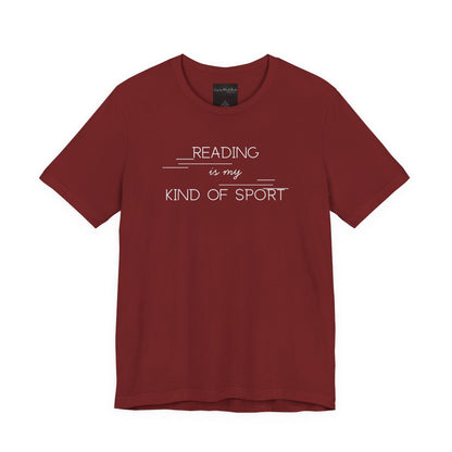 On the front of this custom booklover short sleeve shirt are the words Reading is my Kind of Sport, in a modern font with different length lines on either end of the writing giving the shirt a retro look.