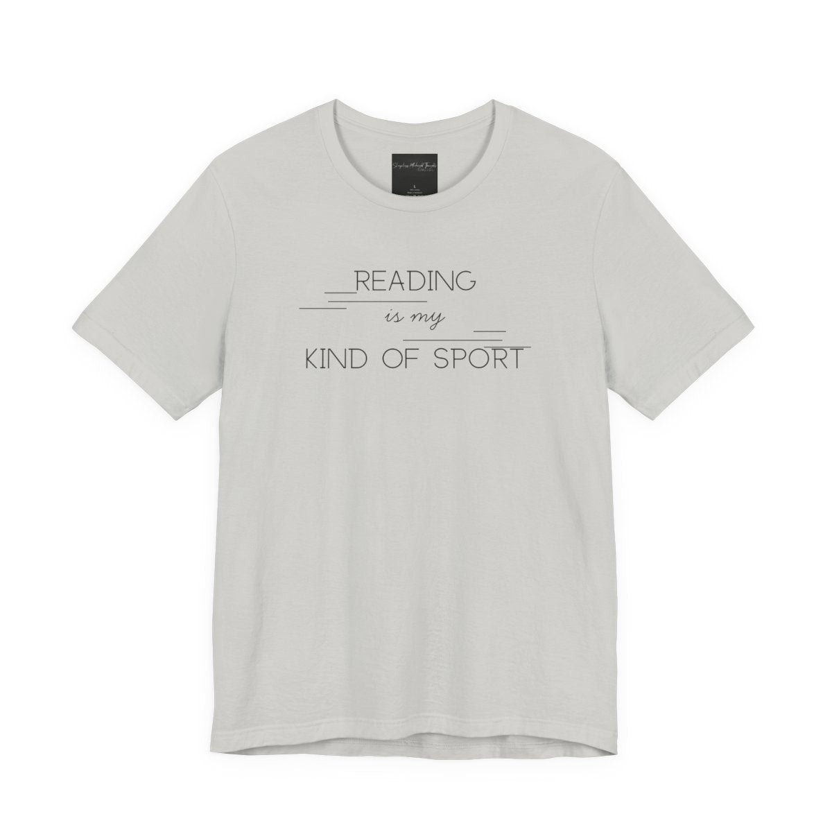 On the front of this custom booklover short sleeve shirt are the words Reading is my Kind of Sport, in a modern font with different length lines on either end of the writing giving the shirt a retro look.