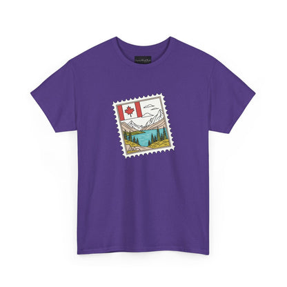 On the front of this custom Canadian pride short sleeve shirt is an image of a Canadian postage stamp with the Canadian flag in one corner and an image of mountains, a lake, and trees the make up the rest of the stamp.